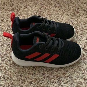 Toddler Adidas. Black with red stripes size 8k.